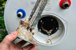 sediment buildup on a traditional water heater